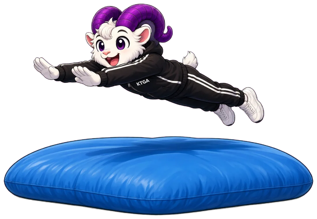 KTGA ram mascot in a tracksuit diving onto a big blue air bag